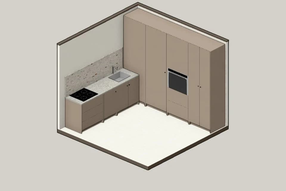 Cocina compacta en L de color topo, con un frente continuo de torres, horno integrado, mesada de granito y piso blanco en espiga, hecha con módulos de rele.